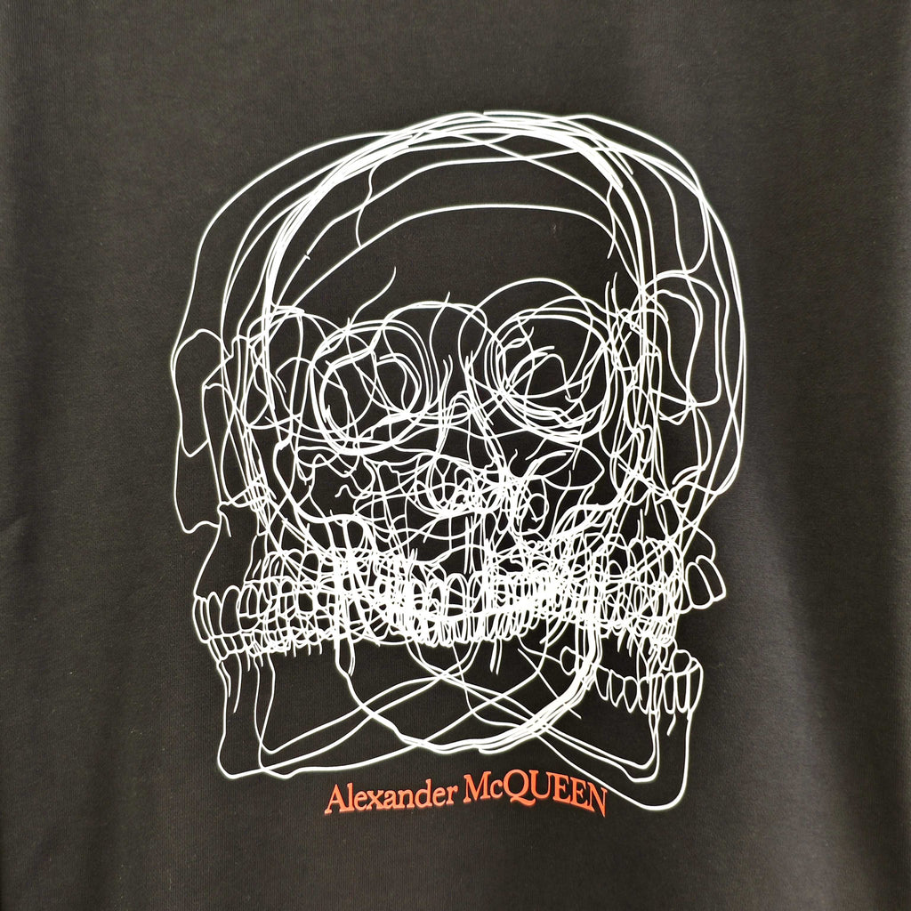 Black crewneck sweatshirt with close-up white line skull graphic and logo text