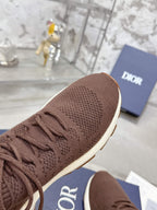 Brown knit sneaker toe with lace-up closure and white sole edge