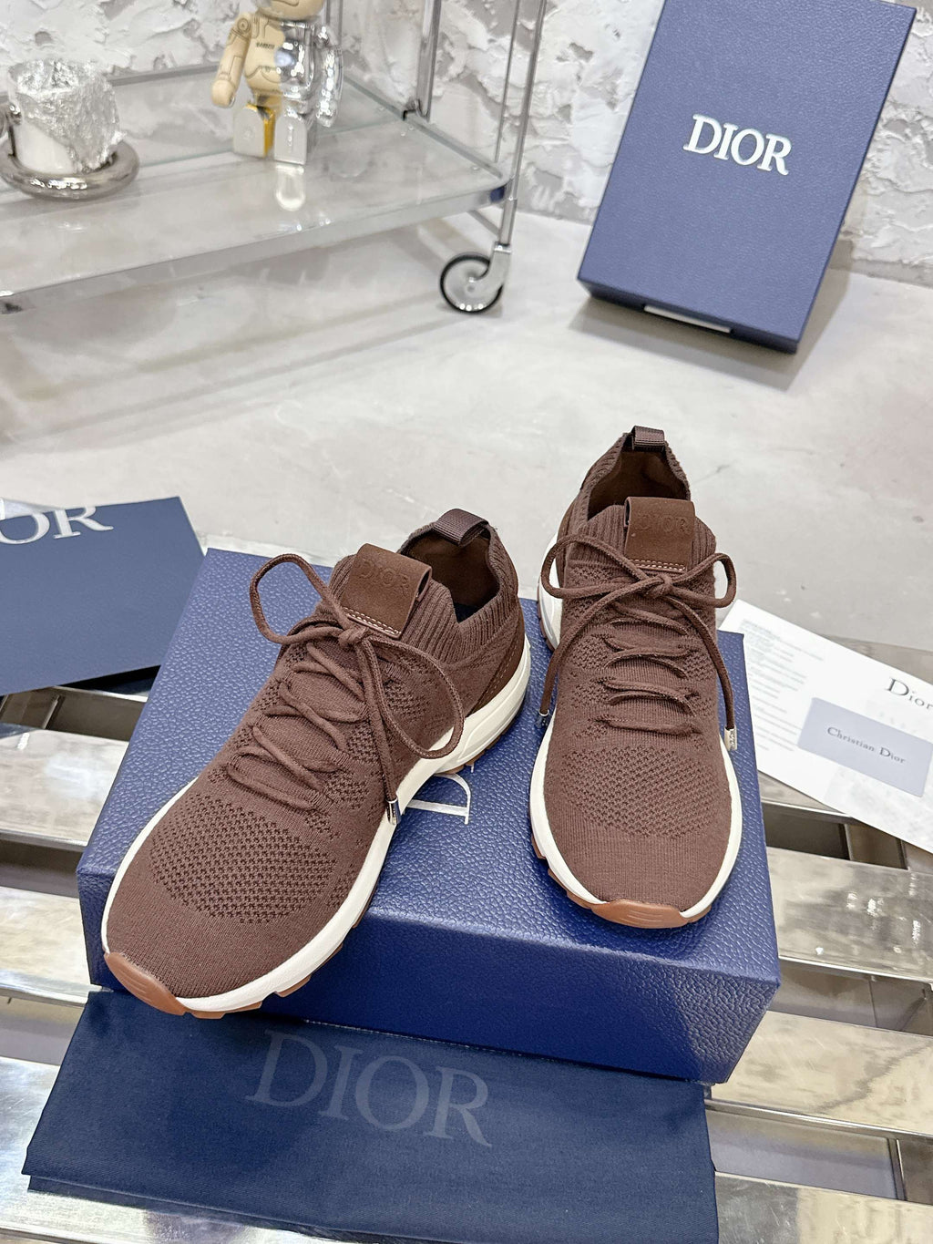 Brown lace-up knit sneakers with white soles