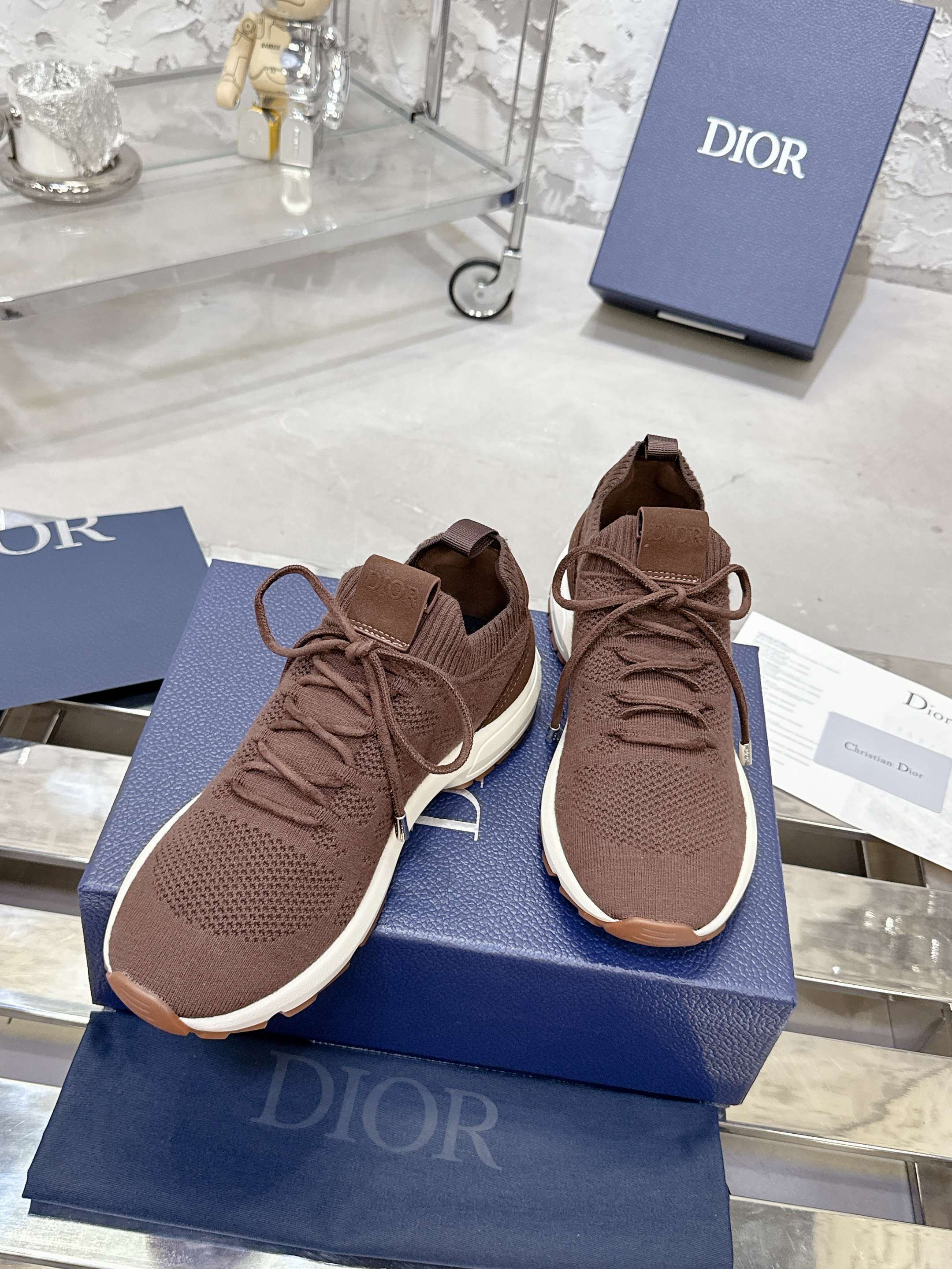 Brown lace-up knit sneakers with white soles