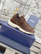 Brown lace-up knit sneaker with sculpted white outsole tread
