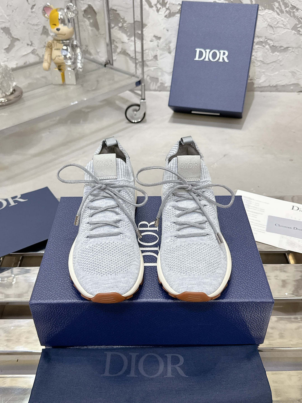 Unisex light gray knit lace-up sneakers with textured gum sole