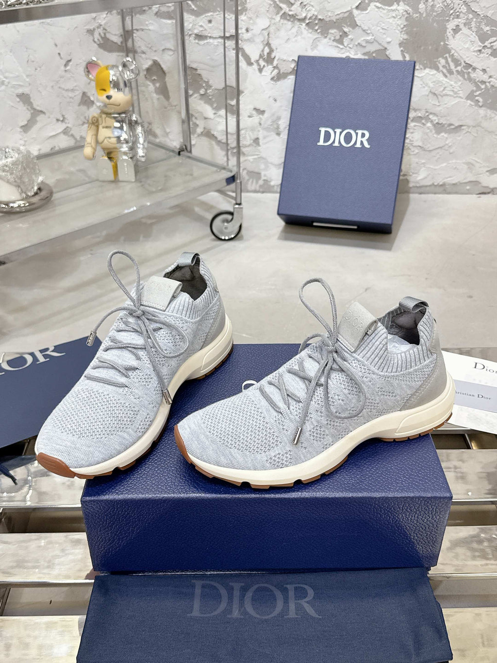 Unisex light gray knit lace-up sneakers with cream outsole