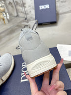Unisex light gray sneaker heel with lace collar and cream logo patch