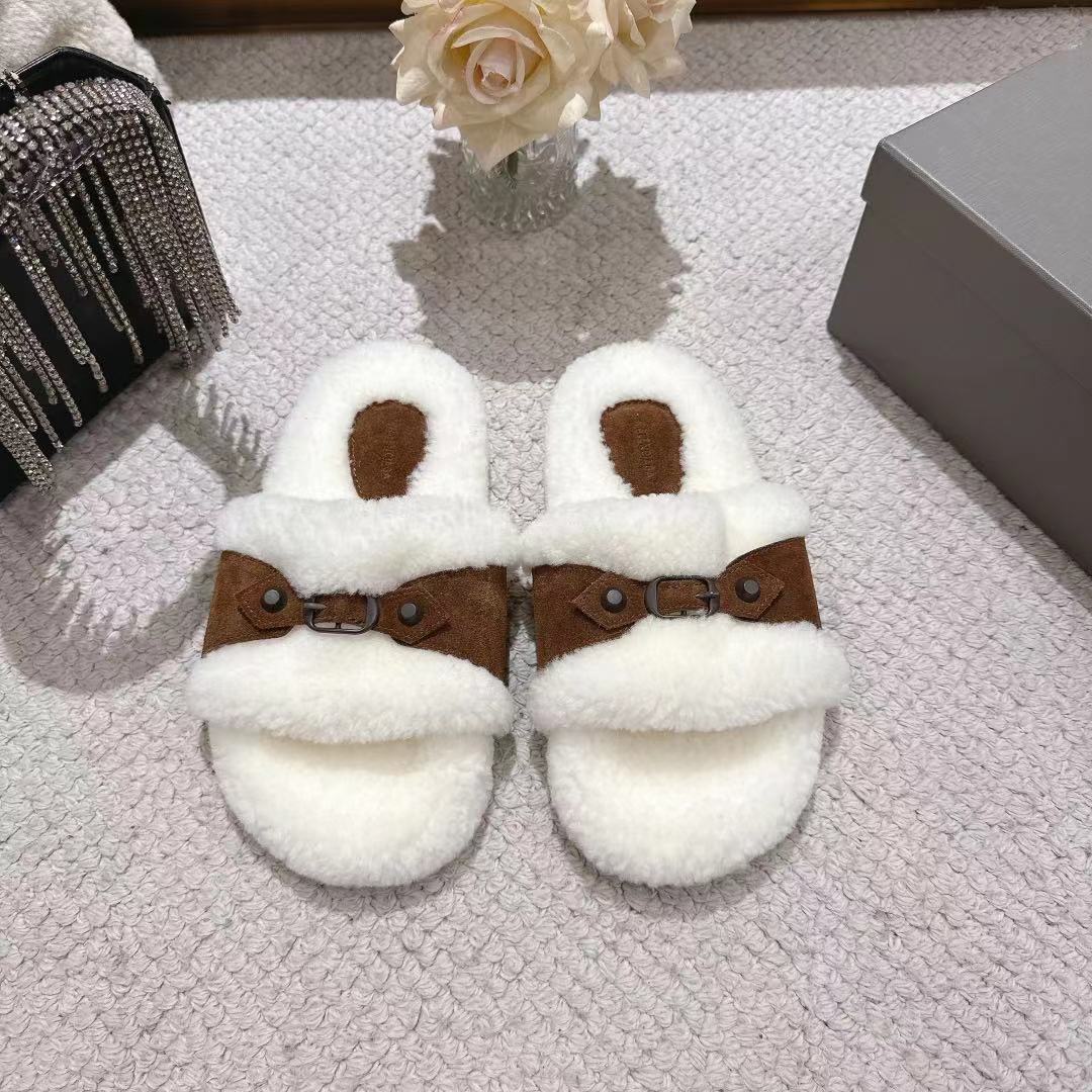 Balenciaga fuzzy slide sandals with brown leather strap and button accents, oval cutout
