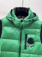 Green hooded puffer vest front with black drawstrings and Moncler logo patch