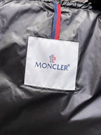 Moncler logo patch on dark gray long jacket