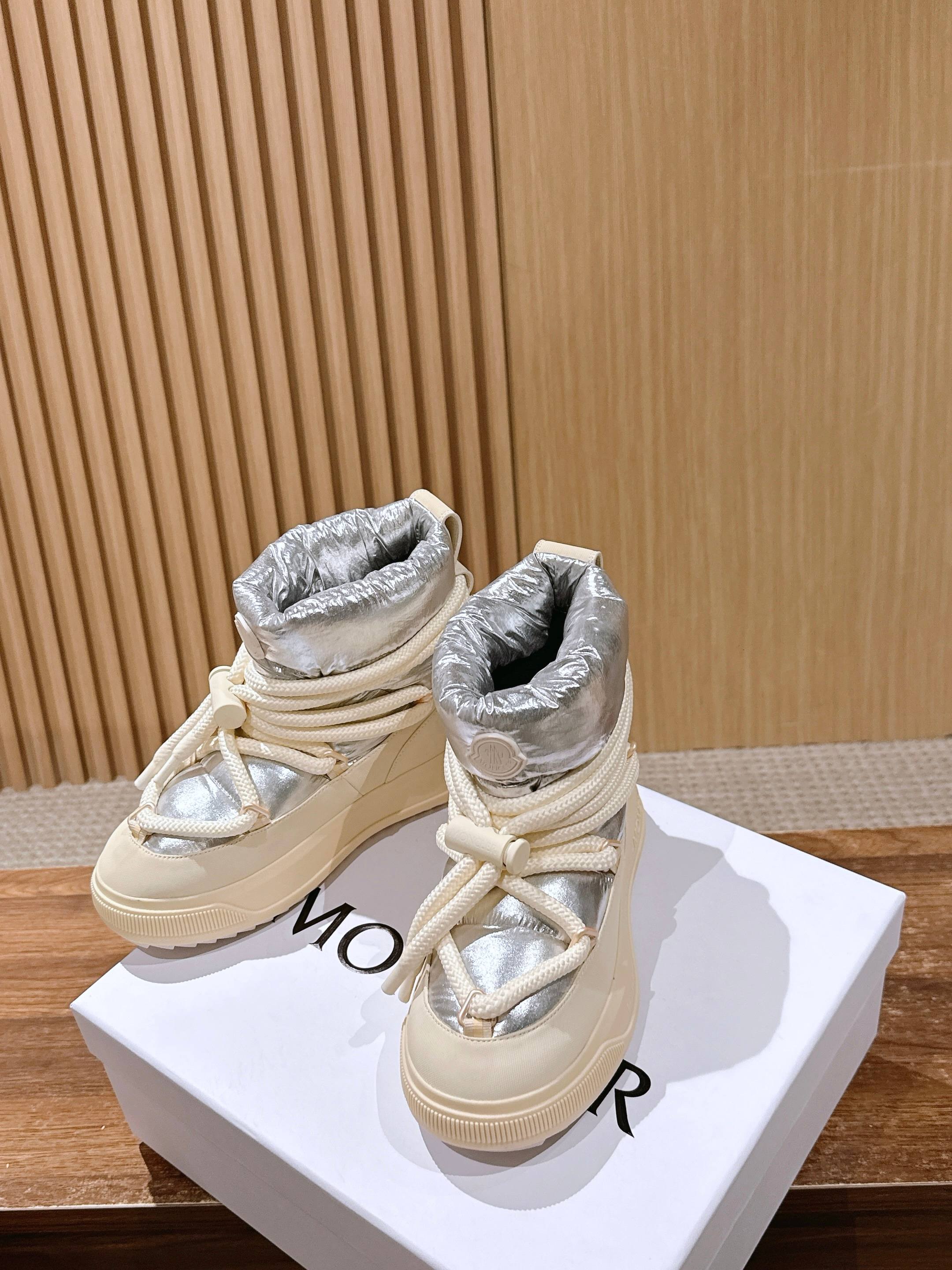 Moncler lace-up sneaker boots with silver padded tongue and cream sole