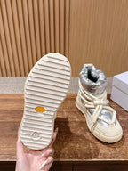 Moncler sneaker boot outsole with striped tread and round logo on sole
