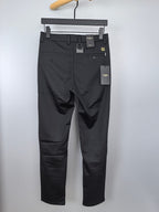 Black tailored trousers with button waist, belt loops, and rear welt pockets