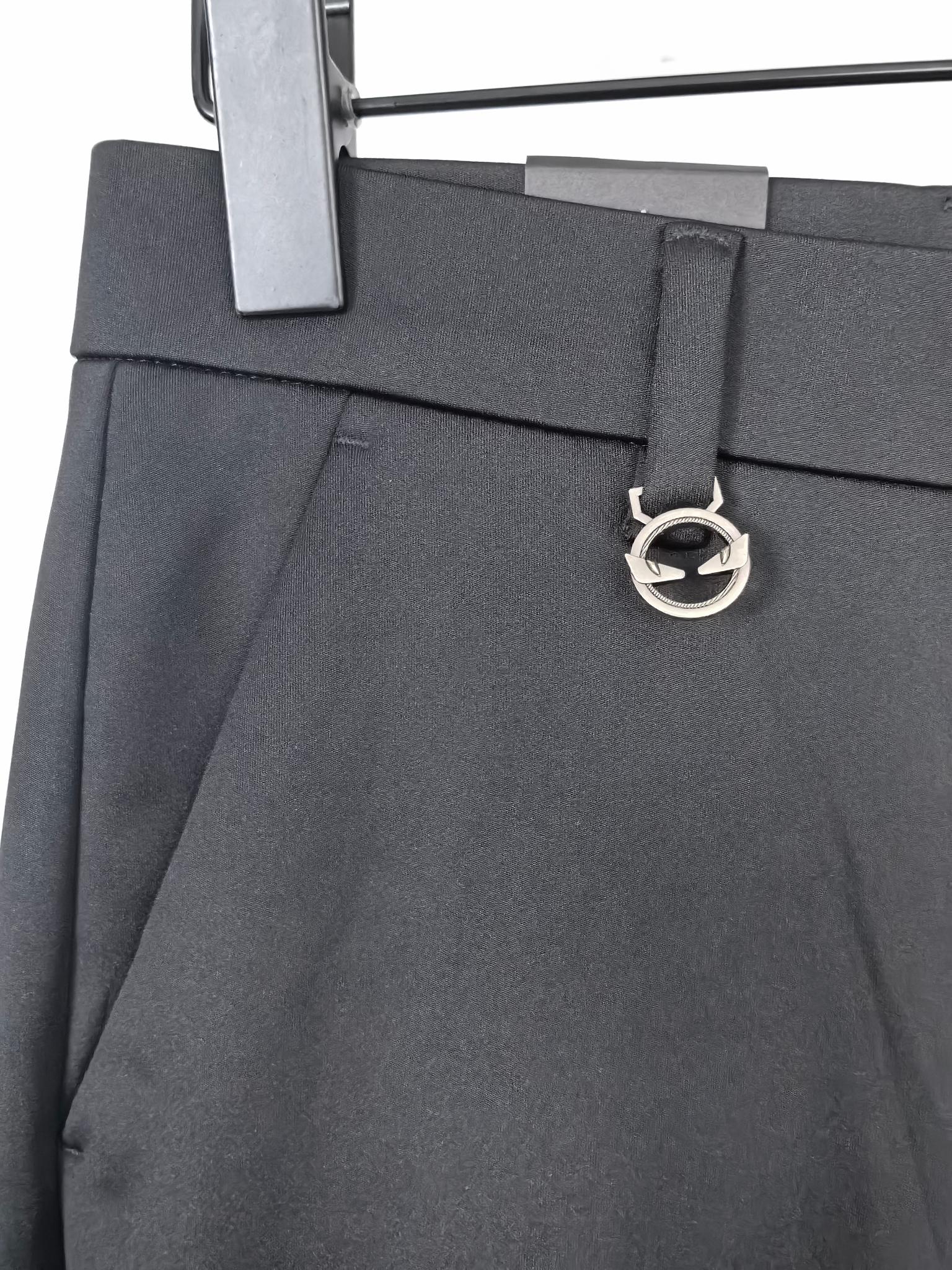 Black trousers with logo d-ring belt detail and slanted side pockets