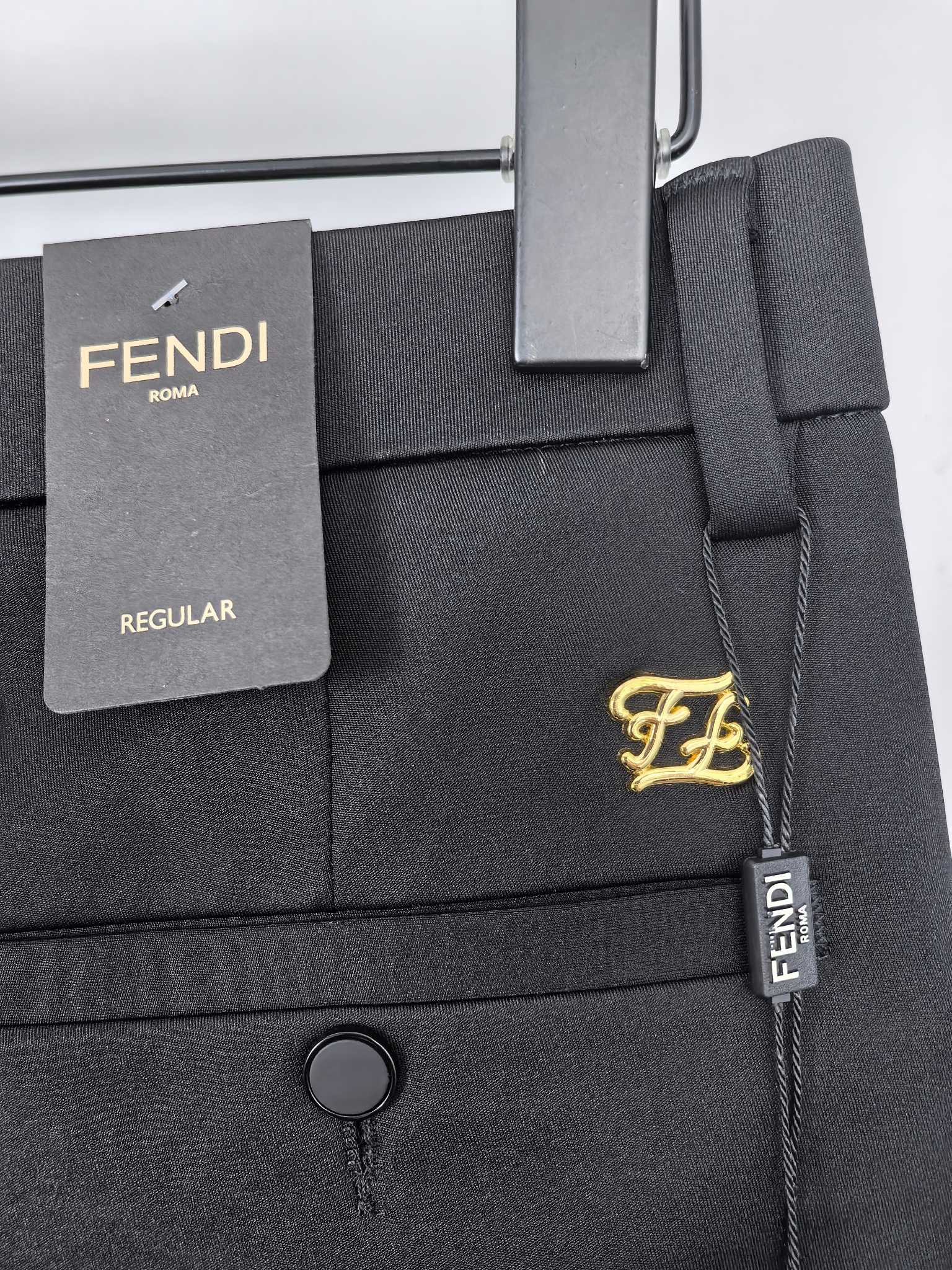 Black Regular-fit trousers with FENDI tag and gold logo charm on belt loop