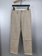 Beige Gucci pants with front button and zip closure