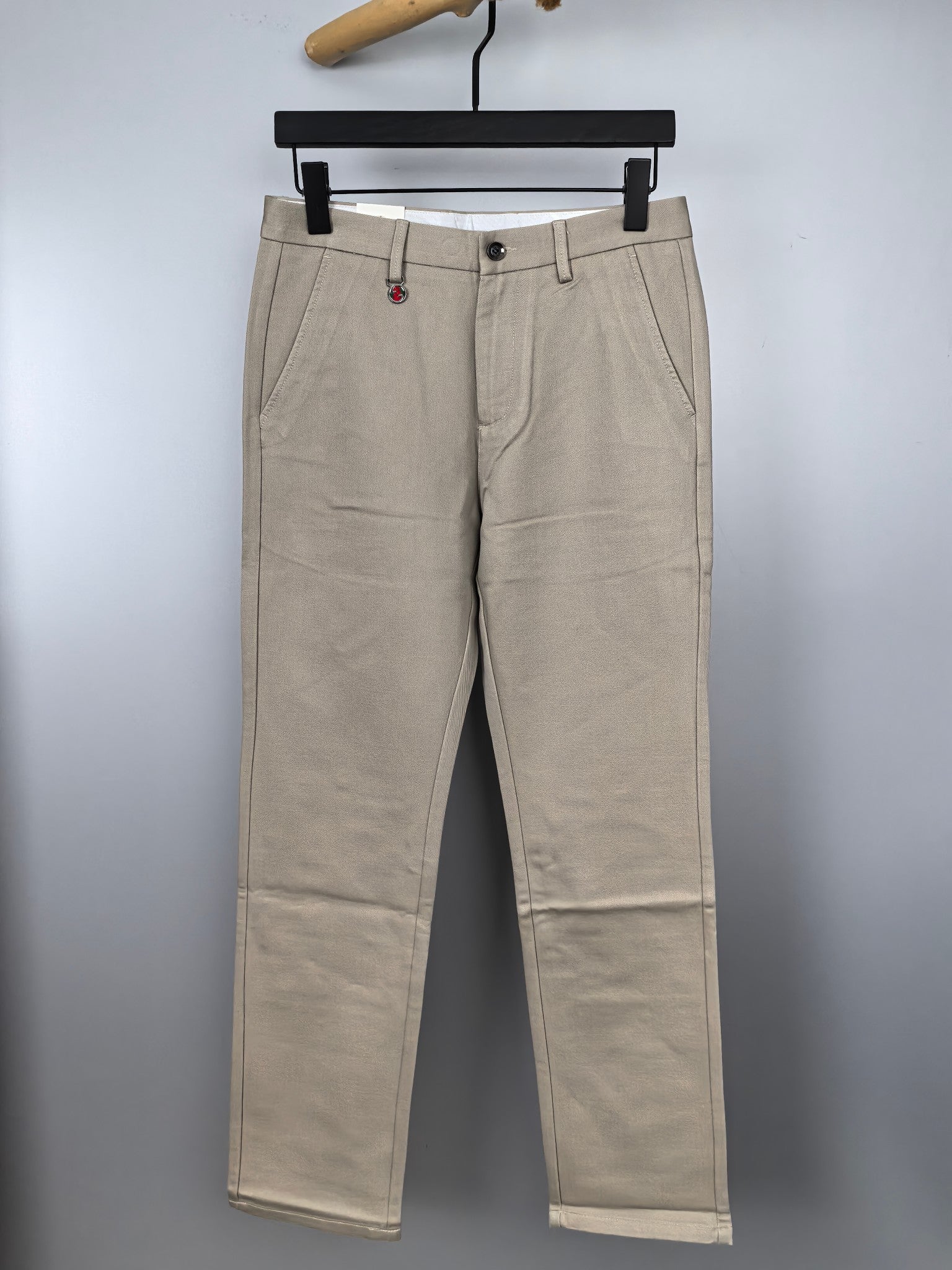 Beige Gucci pants with front button and zip closure