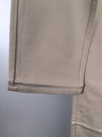 Beige Gucci pants hem with stitched cuff