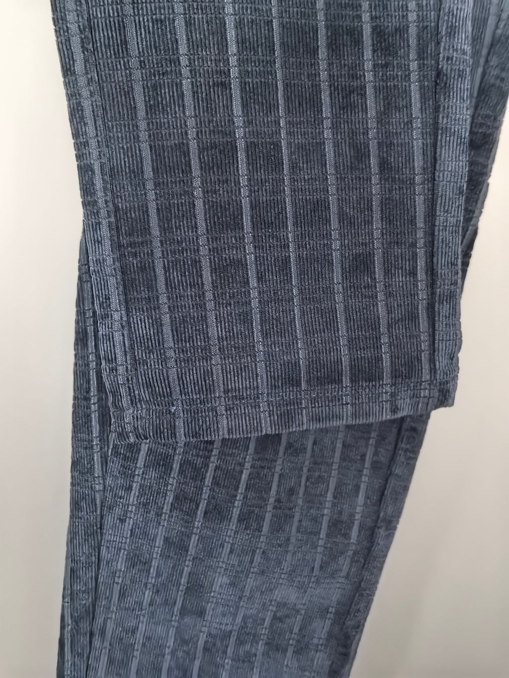 Blue check trousers with stitched hem and folded cuff