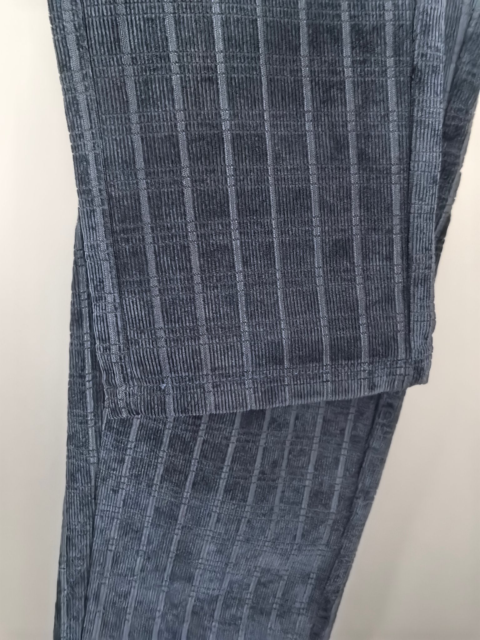 Blue check trousers with stitched hem and folded cuff