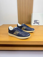 Burberry low-top sneakers in navy with tan check strap and white rubber sole
