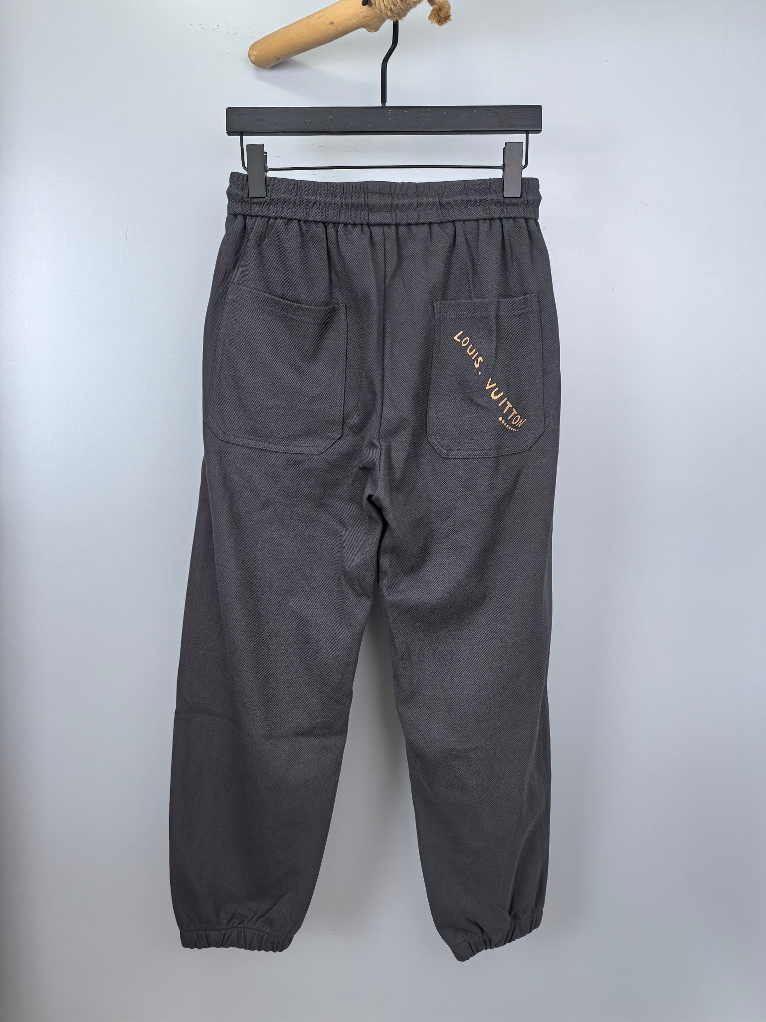 Dark gray Louis Vuitton drawstring jogger pants with side logo patch