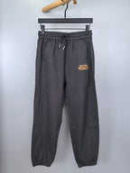 Dark gray Louis Vuitton drawstring jogger pants with front patch pockets