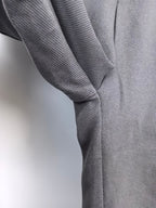Dark gray Louis Vuitton jogger pants with draped fabric and cuffed leg opening