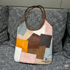 MiuMiu patchwork tote bag with brown top handles and central Miu Miu logo patch
