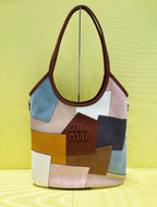 MiuMiu multicolor patchwork tote bag with brown handles and front Miu Miu logo