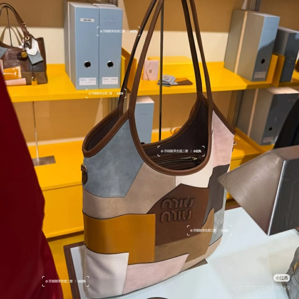 MiuMiu patchwork tote bag with brown leather handles and front Miu Miu logo
