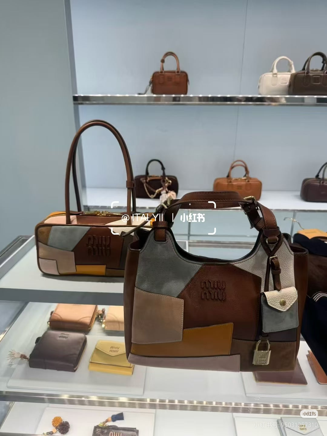 Patchwork tote bag on display shelf with brown, gray, tan and orange panels