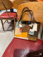 MiuMiu patchwork tote bag, brown/gray/tan with orange panel; small charm and tag
