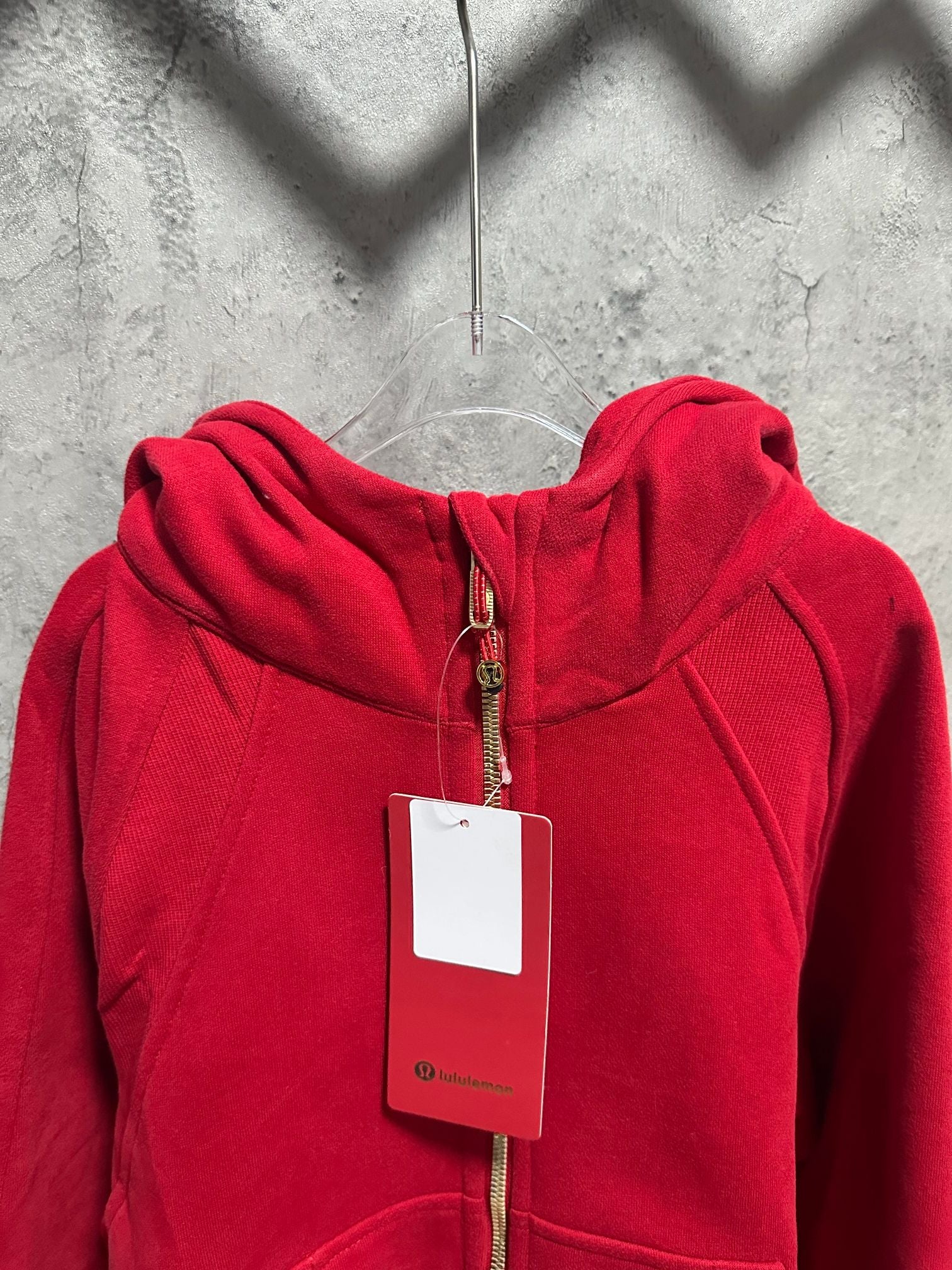 Ralph Lauren red zip-up hoodie hood with front zipper and hanging product tag