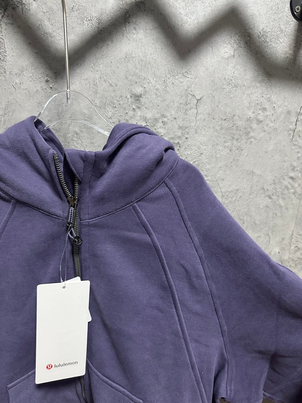 Ralph Lauren zip-up hoodie in dark purple; close view of hood and zipper