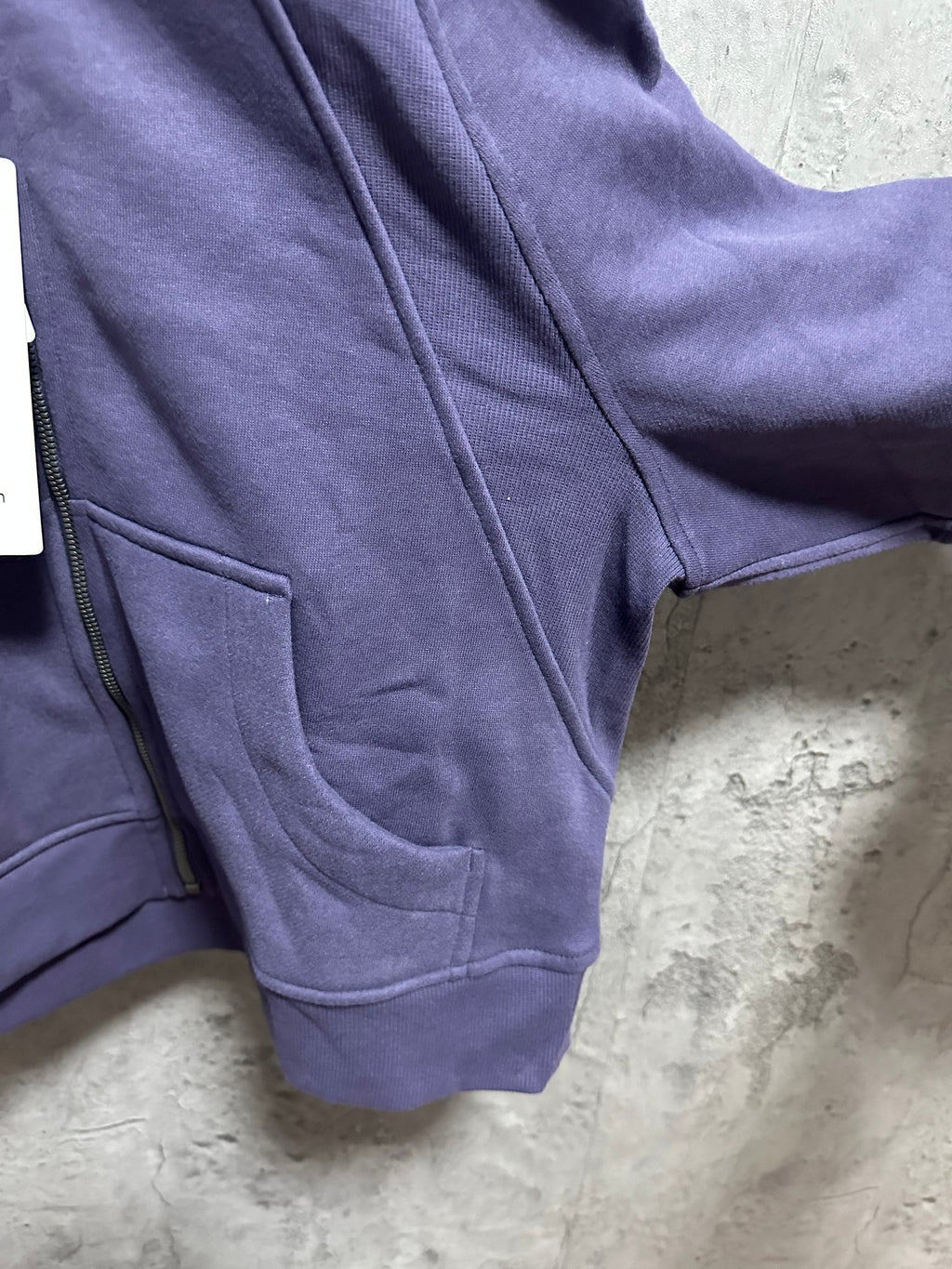 Ralph Lauren hoodie sleeve and front seam detail in dark purple