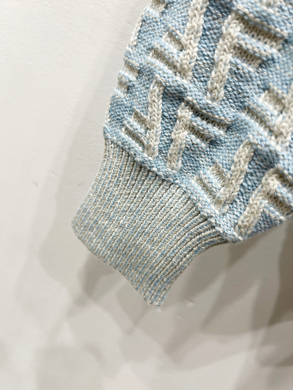 Fendi knit polo sweater cuff with ribbed knit and FF jacquard pattern