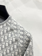 Gray Dior monogram knit jacket shoulder and sleeve detail, side zipper
