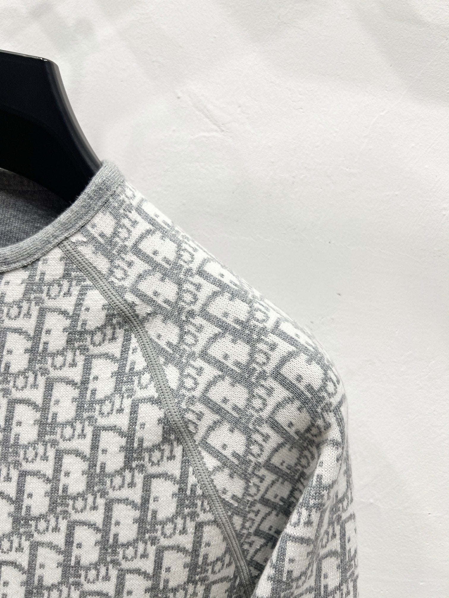 Gray Dior monogram knit jacket shoulder and sleeve detail, side zipper