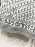 Gray Dior monogram jacket hem with CHRISTIAN DIOR logo band