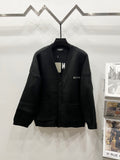 Balenciaga black knit cardigan with button front, ribbed collar and V-neck placket