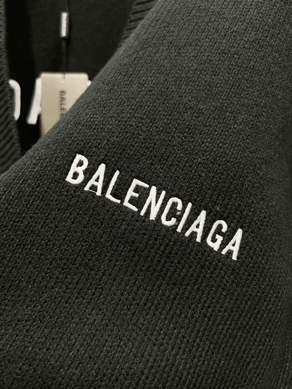 Balenciaga black knit cardigan with BALENCIAGA lettering on sleeve