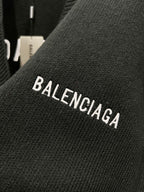Balenciaga black knit cardigan with BALENCIAGA lettering on sleeve