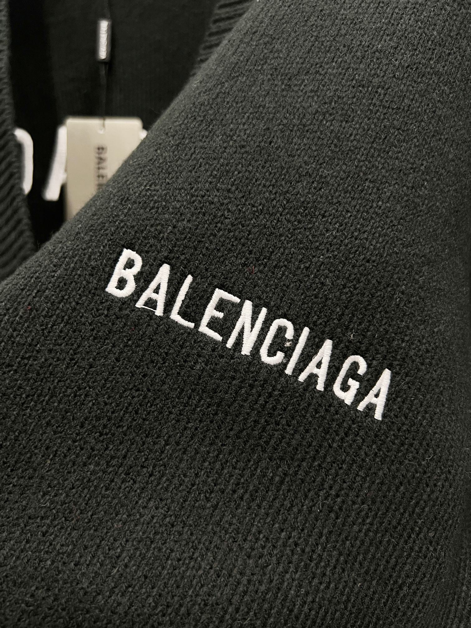 Balenciaga black knit cardigan with BALENCIAGA lettering on sleeve