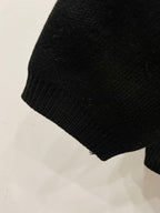 Balenciaga black knit cardigan sleeve hem with textured ribbed cuff