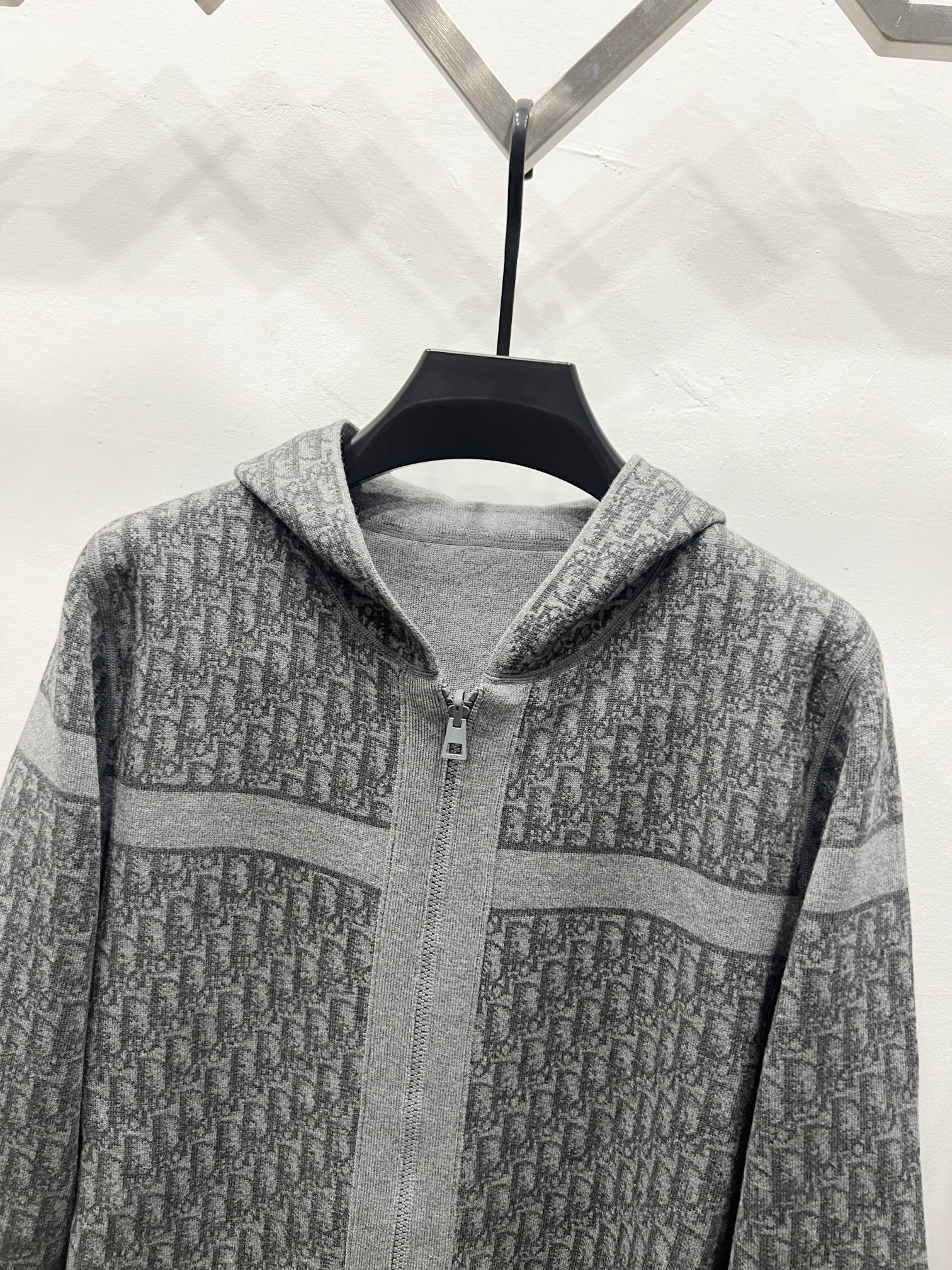 Grey hooded zip jacket with allover Dior-style motif and contrast stripe on chest