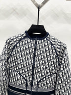 Dior-logo patterned zip jacket close-up with knit stand collar and banded hem