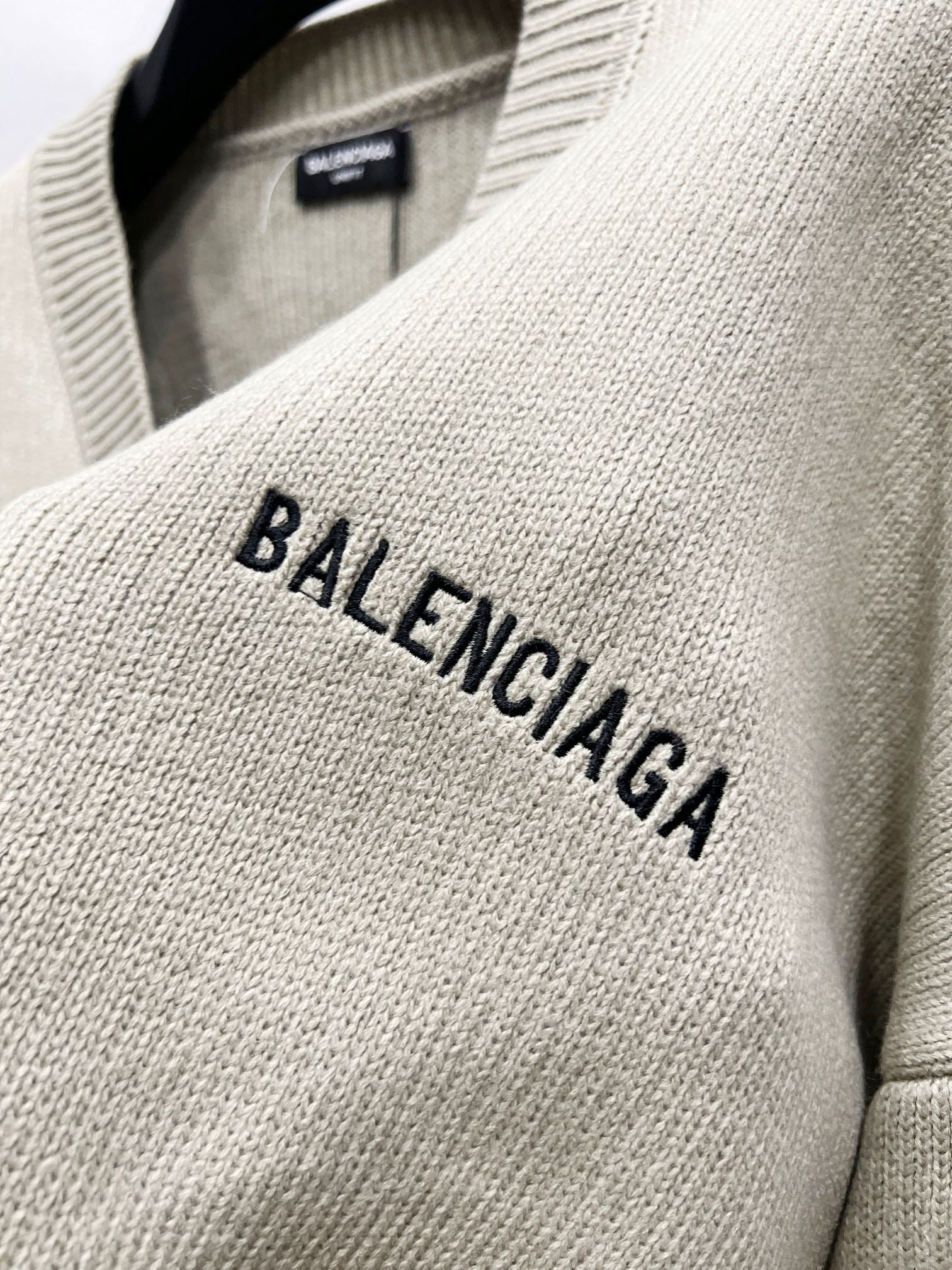 Beige knit sweater chest with embroidered BALENCIAGA lettering