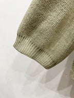 Beige knit cardigan hem with ribbed knit edge