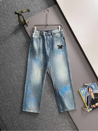 Light blue denim jeans with black logo on front, wide straight leg, belt loops