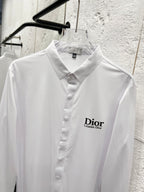 White long-sleeve button-up shirt on hanger with Dior logo