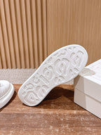 Alexander McQueen leather sneakers outsole, white, textured rubber tread pattern