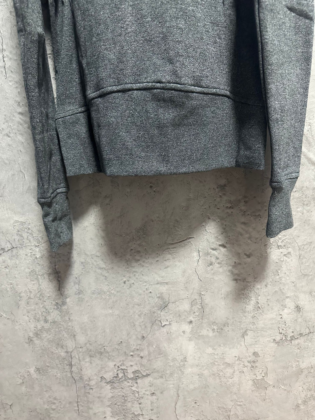 Ralph Lauren hoodie bottom hem view, dark gray heather with ribbed trim